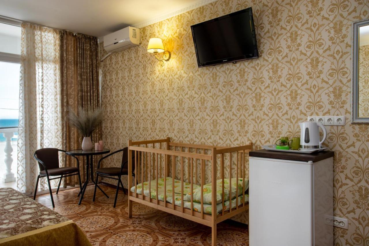 Olimp Hotel Zaliznyi Port Esterno foto