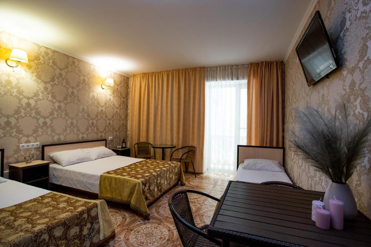 Olimp Hotel Zaliznyi Port Esterno foto